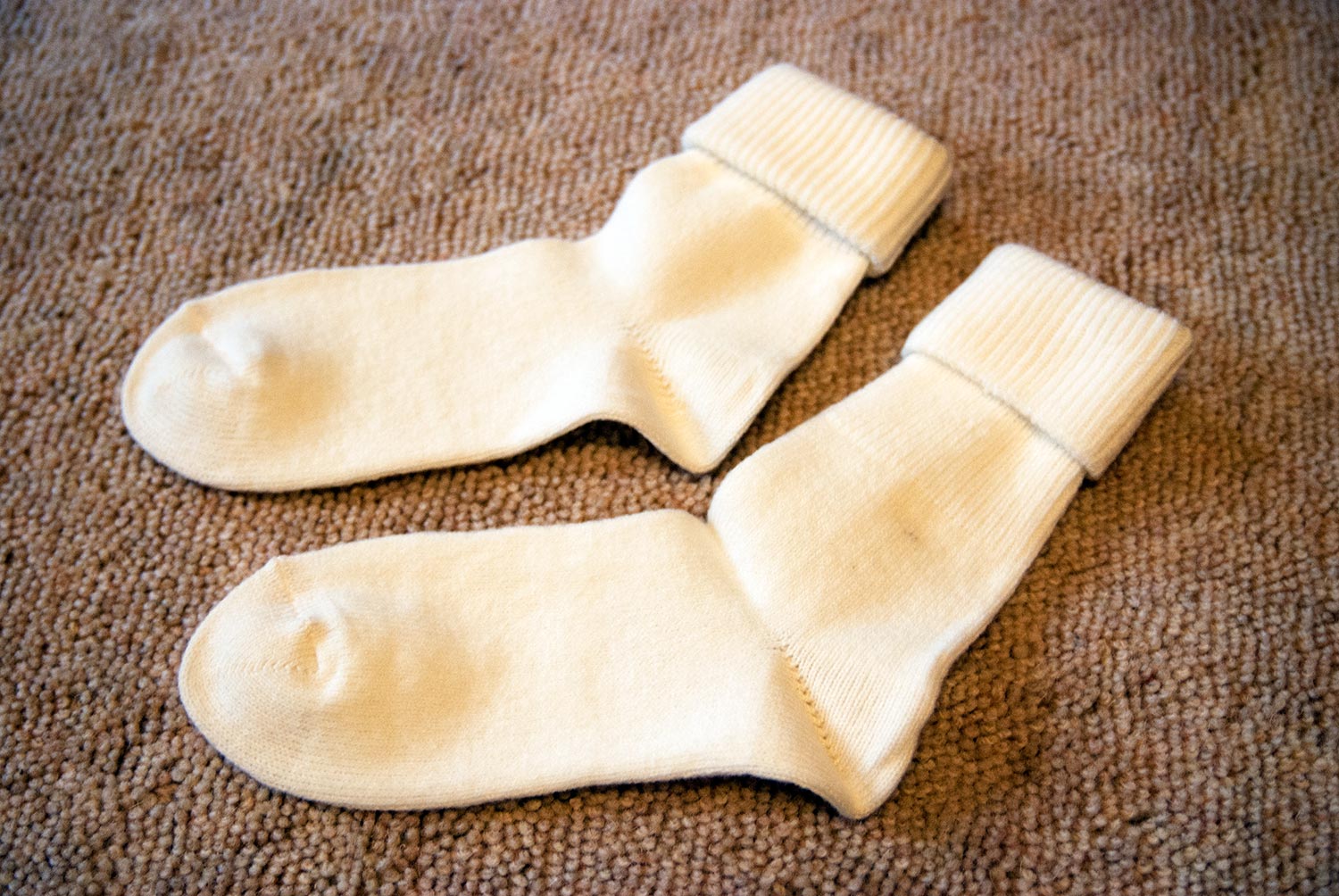 Белые тёплые носочки. Фото: bracatuS.com