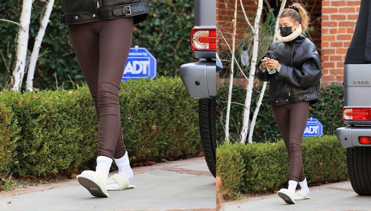 Хейли Бибер дополнила уличный зимний аутфит пушистыми тапочками и белыми носками